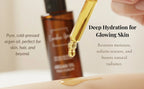 Organic Canadian Grace Wellness 100% argan oil bottle with dropper, ideal for dry skin and frizz-prone hair care.