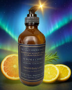 The InnerCandescent Co Aurora Citrus hand and body lotion bottle with a bright citrus scent, featuring a sleek design and vibrant label.