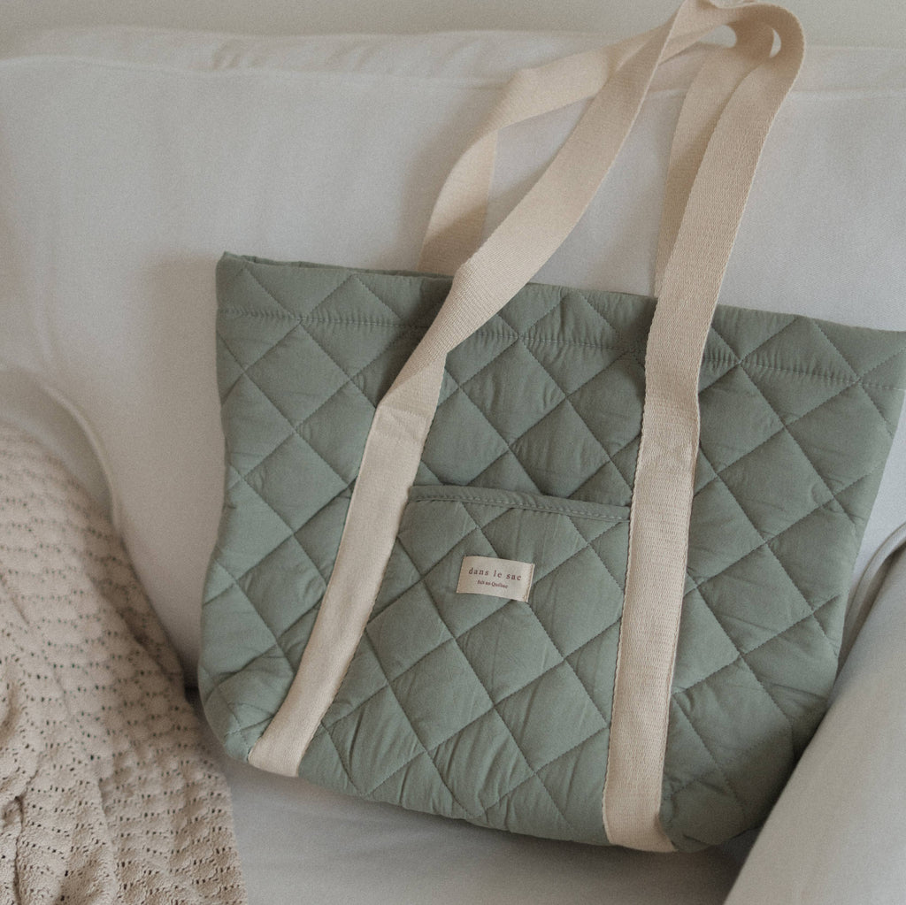 Reusable quilted tote bag by Dans Le Sac, daily carry with padded fabric and spacious interior for everyday essentials.