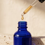 Pure Wash beard oil bottle with dropper, showing the product used for beard growth and conditioning.