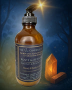 The InnerCandescent Co ROOT & RESTORE grounding botanical hand and body lotion bottle with floral and botanical design.