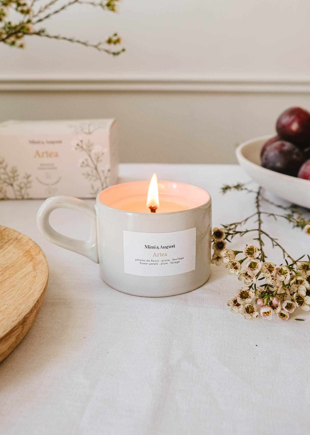 Artea reusable soy candle by Mimi & August in a 5oz glass jar with a wooden wick and minimalist label design.