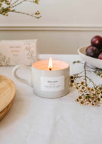 Artea reusable soy candle by Mimi & August in a 5oz glass jar with a wooden wick and minimalist label design.