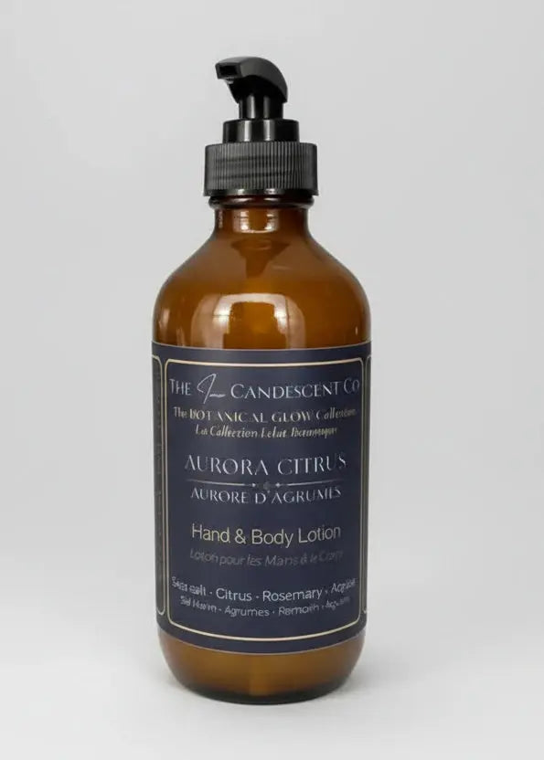 The InnerCandescent Co Aurora Citrus hand and body lotion bottle with bright citrus scent and luxurious packaging.