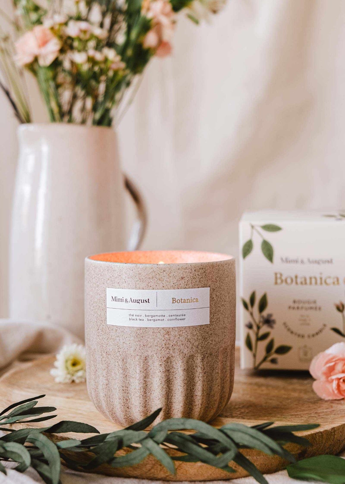 Botanica reusable candle in 11oz jar by Mimi & August, natural botanical design, wax candle with a wooden wick.