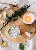 Botanica reusable candle by Mimi & August in a 3oz glass jar with botanical label and natural wax finish.