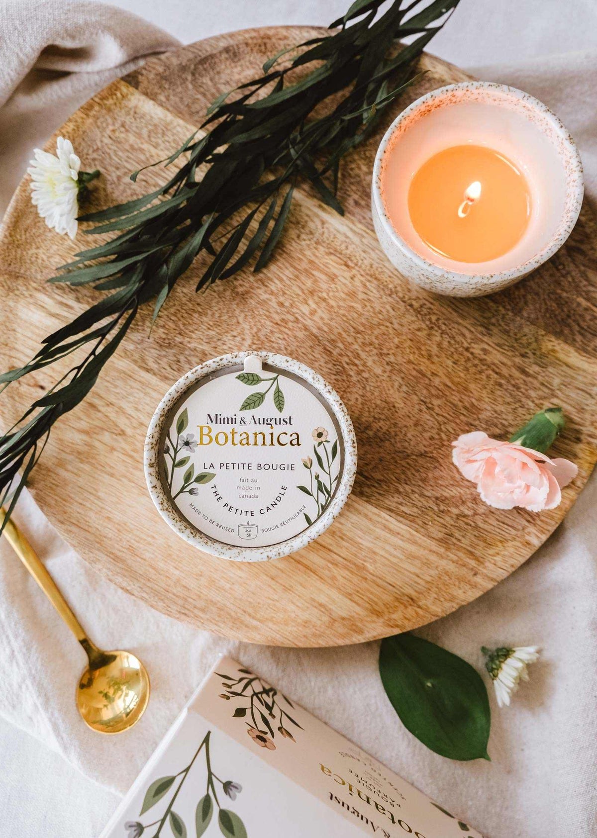 Botanica reusable candle by Mimi & August in a 3oz glass container with botanical design, perfect for eco-friendly home decor.