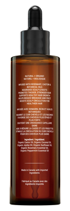 Back view of Canadian Grace Rosemary and Castor Hair Oil bottle showing the label and product details.