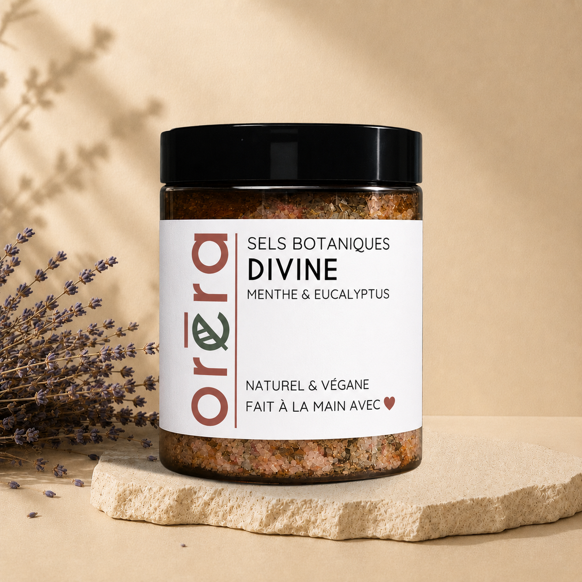 Natural bath salts with mint and eucalyptus from La Sultana Savonnerie, featuring botanical ingredients in a clear glass jar.