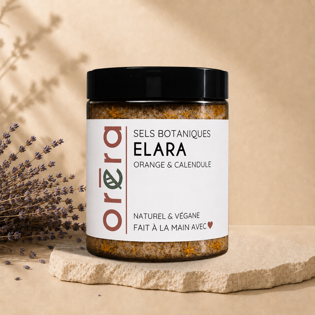 Natural bath salts in a jar with orange and calendula from La Sultana Savonnerie, handcrafted in Québec.