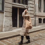 Reusable teddy fabric tote bag by Dans Le Sac, featuring soft, plush material and spacious design for everyday use.