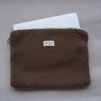 Tissu ordinateur pochette in Dans Le Sac, slim fabric case with zipper for laptops or tablets, featuring a sleek, modern design.