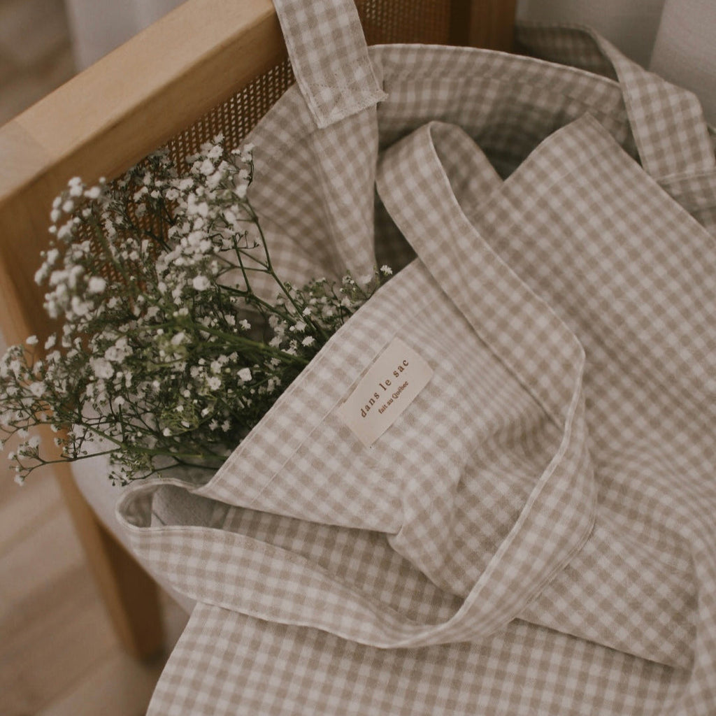 Reusable cotton tote bag with Vichy check pattern from Dans Le Sac, featuring eco-friendly organic fabric and sturdy handles.