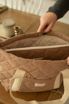 Reutilisable matelassé daily tote bag from Dans Le Sac with padded design and sturdy handles, ideal for everyday use.