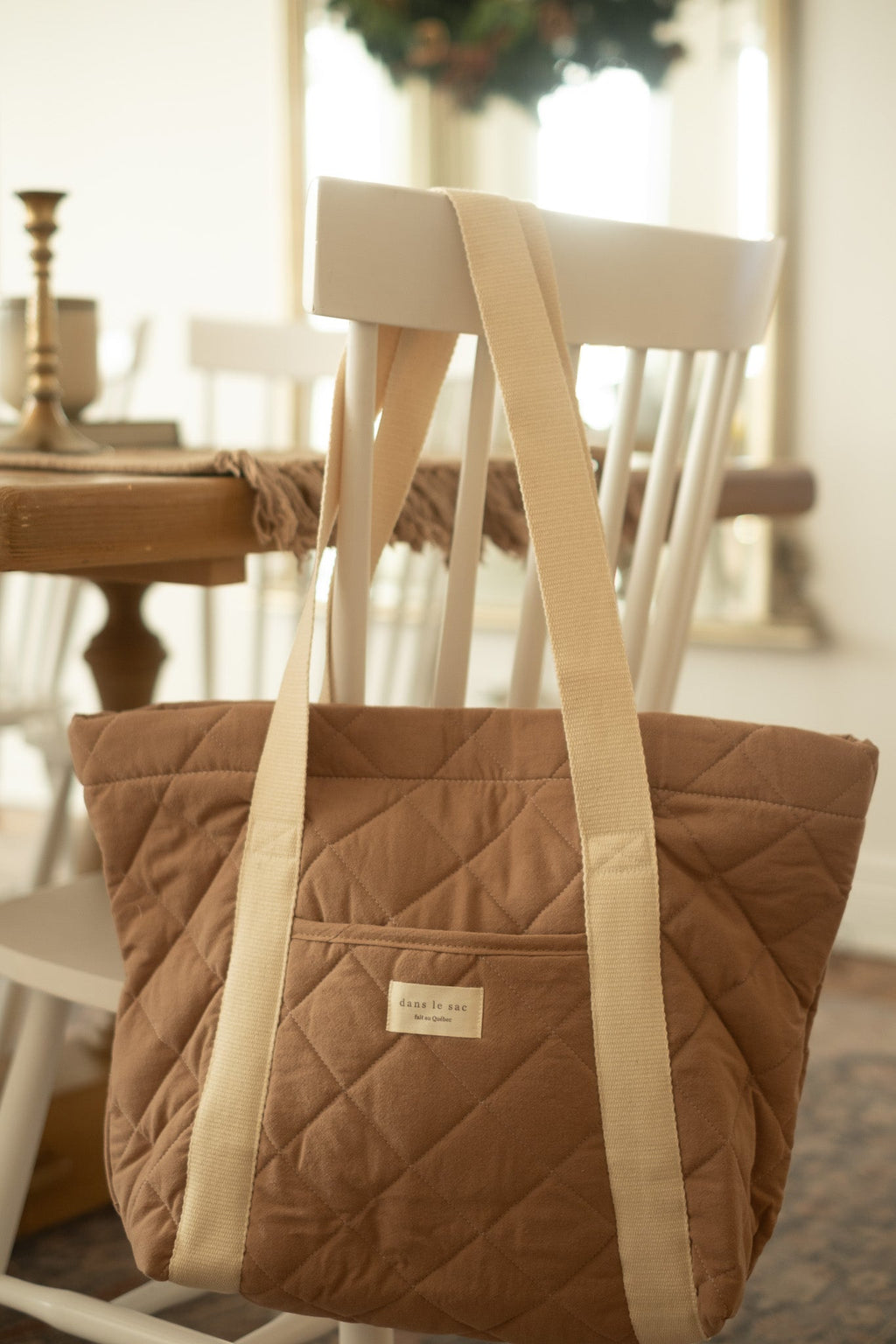 Reversible quilted reusable tote bag by Dans Le Sac, featuring padded design and sturdy handles for everyday use.