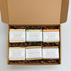 Handmade floral essential oil soap bar from The InnerCandescent Co with vibrant, natural colors and floral design on the surface.