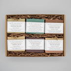 Golden Cedar Warm Cedar Handmade Soap Bar by The InnerCandescent Co, shown face up with a golden-toned, textured soap surface.