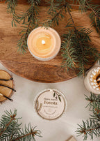 Mimi & August Foresta reusable candle in a glass holder with a natural wooden lid, eco-friendly candle for cozy decor.