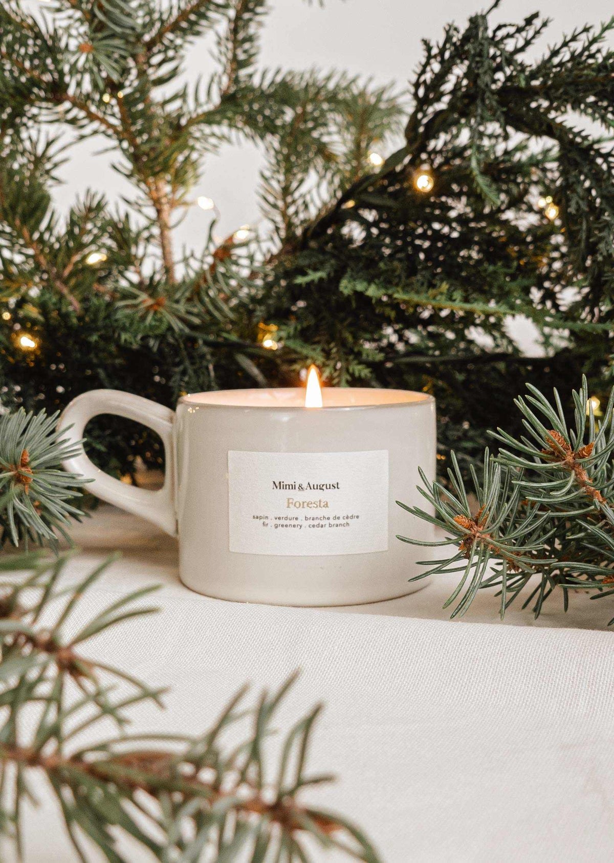 Foresta reusable candle by Mimi & August featuring a natural wood wick and eco-friendly design in a glass jar.