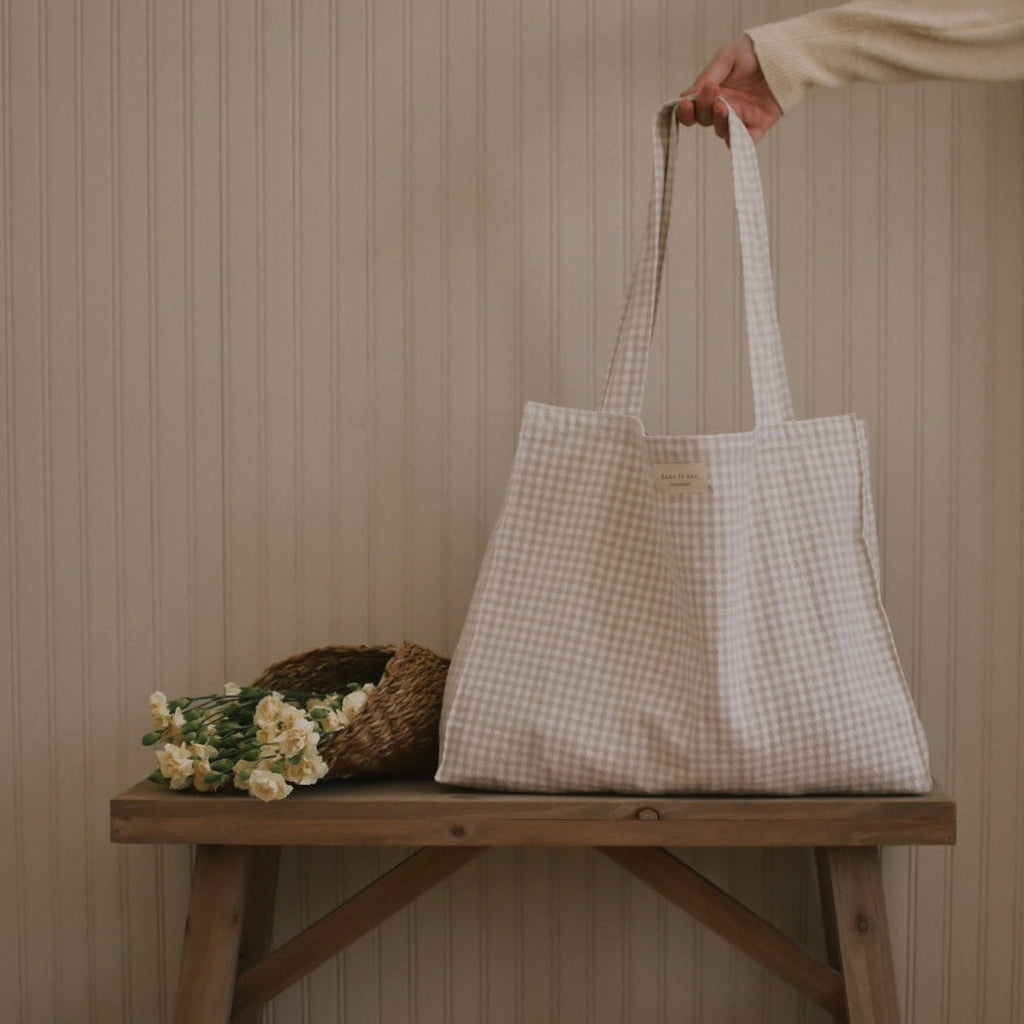 Reusable cotton tote bag from Dans Le Sac's Vichy collection, featuring a classic checkered design, made in Quebec.