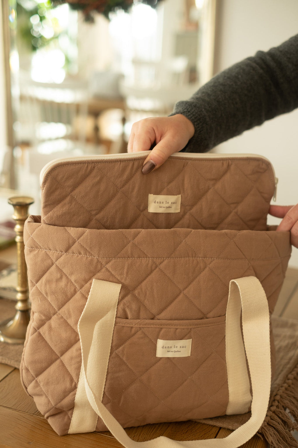 Reversible quilted tote bag from Dans Le Sac with compartments for laptop and daily essentials, stylish and reusable.