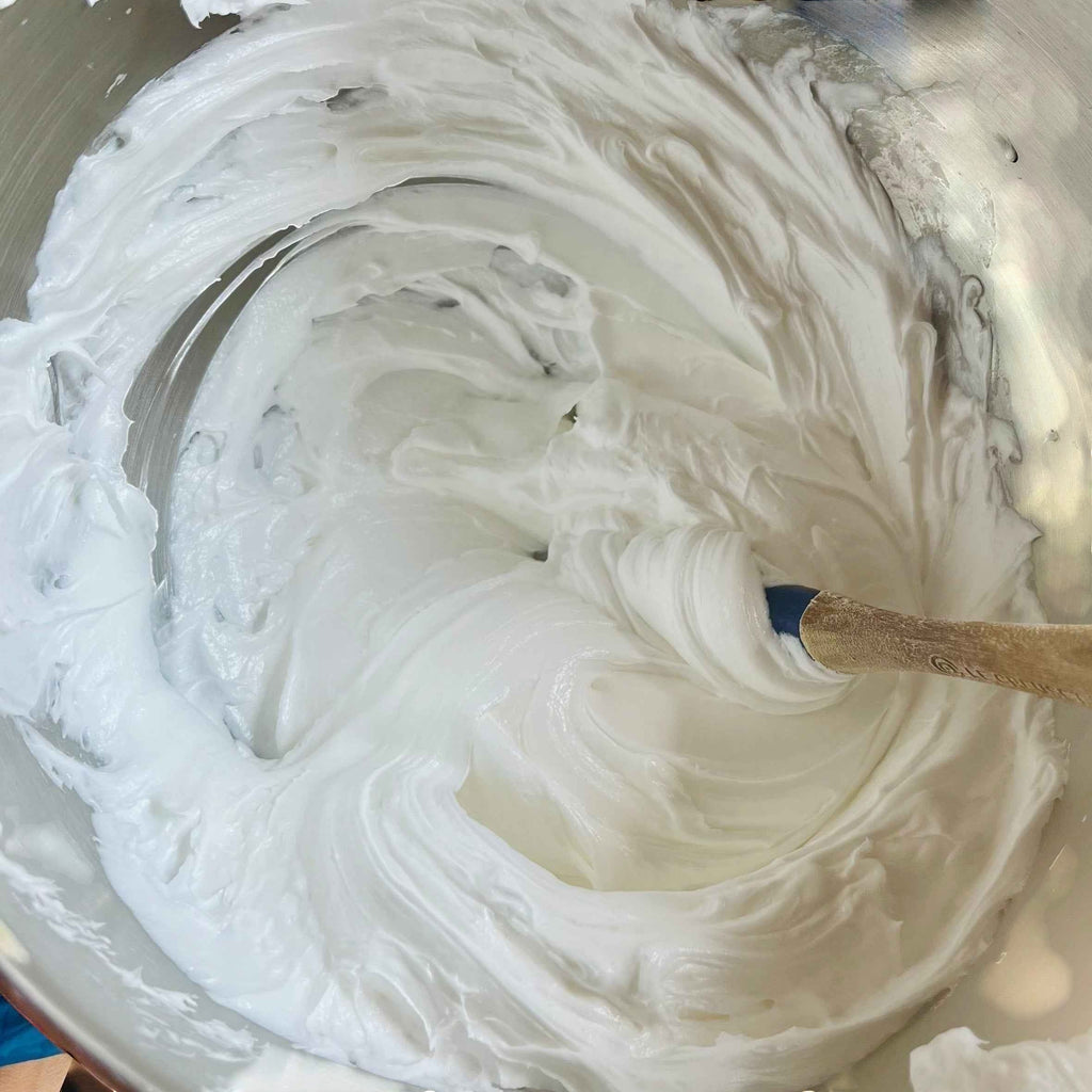 Handmade Alyson whipped soap with coconut milk and mango, featuring natural ingredients and a creamy, luxurious texture.