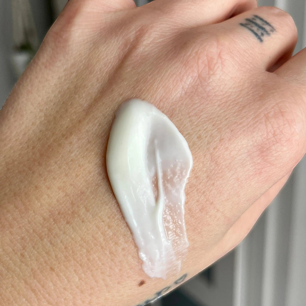 Natural face moisturizer cream with chaga and mango butter from La Sultana Savonnerie, featuring a jar of hydrating skincare product.