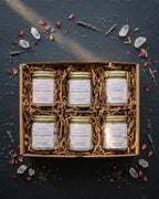 The InnerCandescent Co mineral bath soak gift set with four luxurious mineral bath products in elegant packaging.