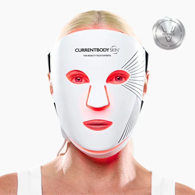 CurrentBody Skin LED Light Therapy Mask Series 2 with red and near-infrared lights for anti-aging and wrinkle reduction, worn on face.