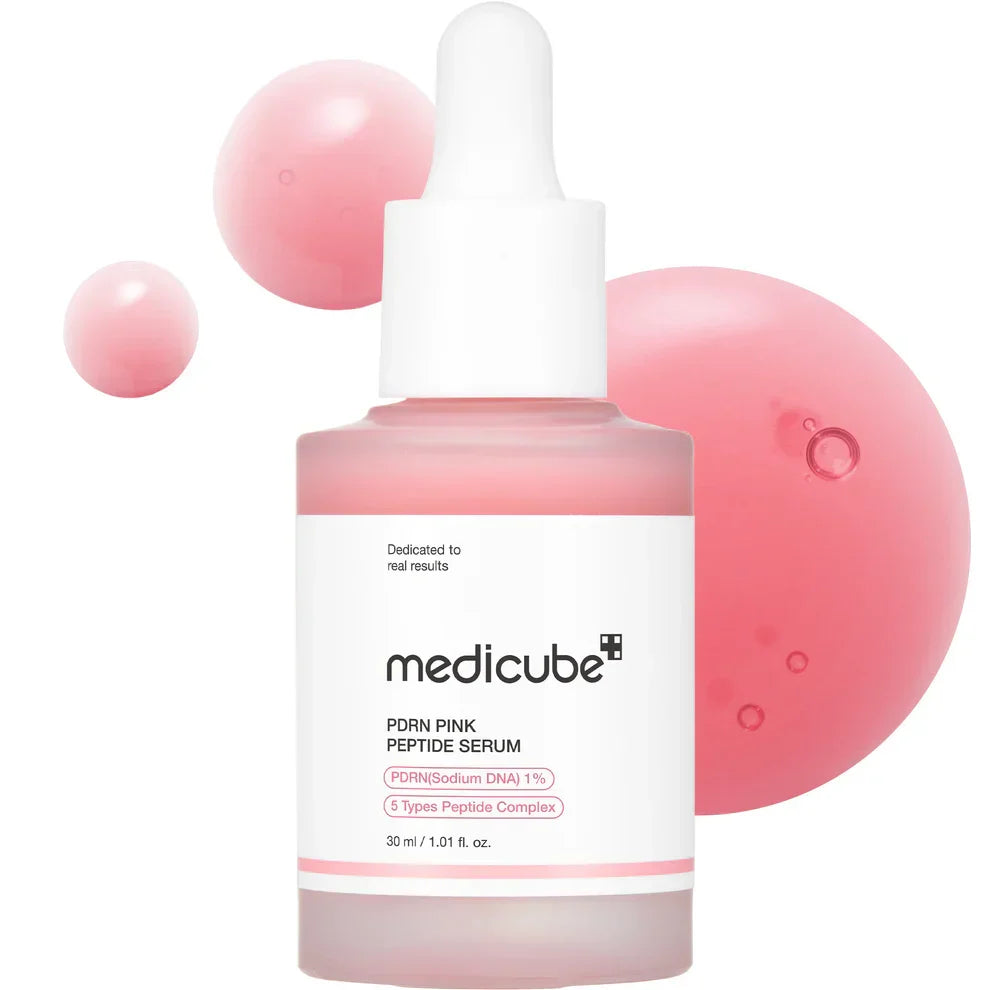 Medicube PDRN Pink Peptide Serum bottle with rose gold accents, showcasing the serum's packaging for glow and elasticity.