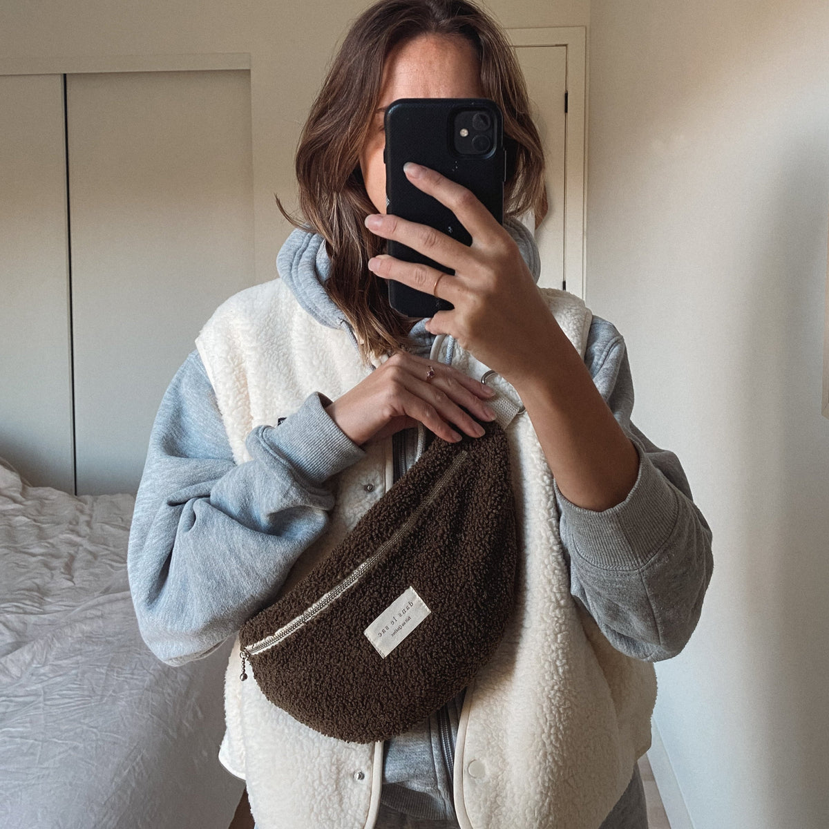 Reusable zipper closure waist bag from Dans Le Sac, showing its compact design and zipper detail.