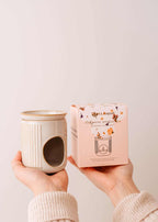 Mimi & August Lueur aromatic ceramic diffuser candle warmer with a sleek, modern design for essential oils and fragrances.