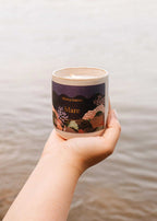 Mare reusable candle in an 8oz glass jar from Mimi & August, with a natural wax finish and a cotton wick.
