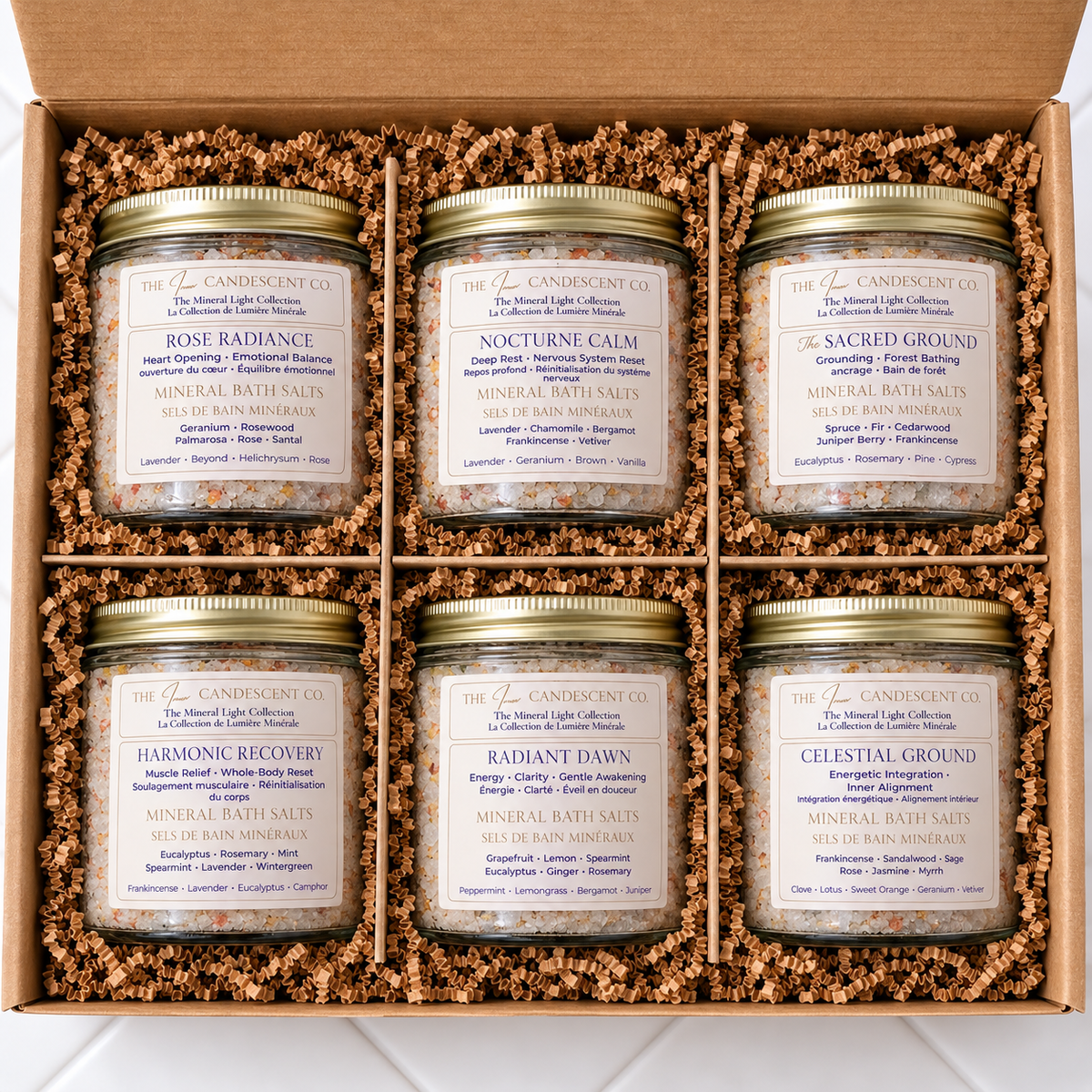 The Mineral Light Collection luxury mineral bath soak gift set from The InnerCandescent Co featuring multiple bath soak pouches and elegant packaging