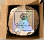 Open box of AQUA SOLACE water element candle by The InnerCandescent Co featuring fresh aquatic, coconut, and apricot wax details.