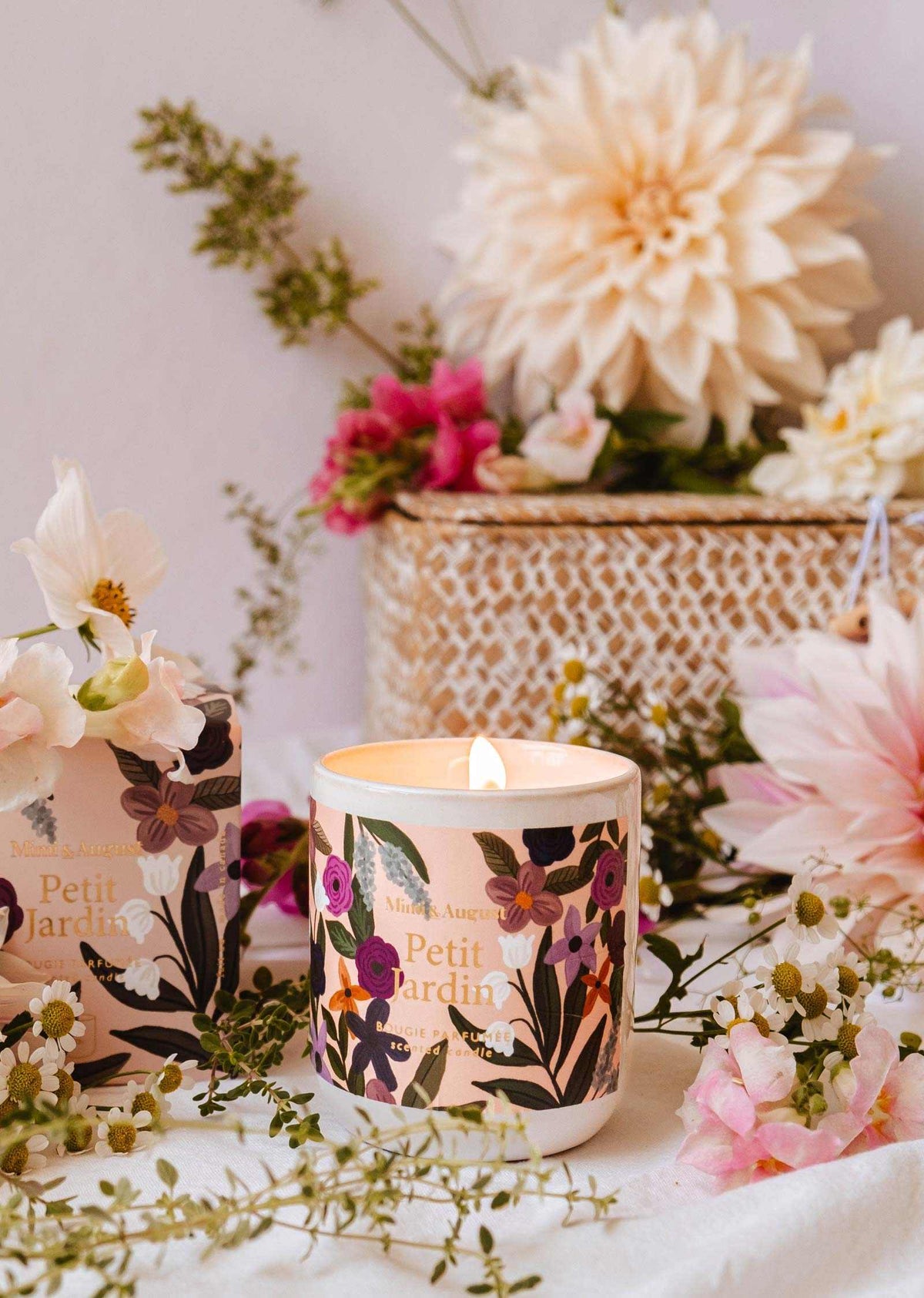 Mimi & August Petit Jardin reusable 8oz candle with a natural botanical design and wooden wick, eco-friendly and decorative.
