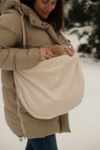 Reusable corduroy croissant bag with adjustable strap by Dans Le Sac, featuring a zipper closure and compact design.