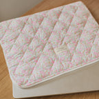 Tissu pochette pour ordinateur de Dans Le Sac, protection élégante et compacte pour laptop, avec fermeture sécurisée.
