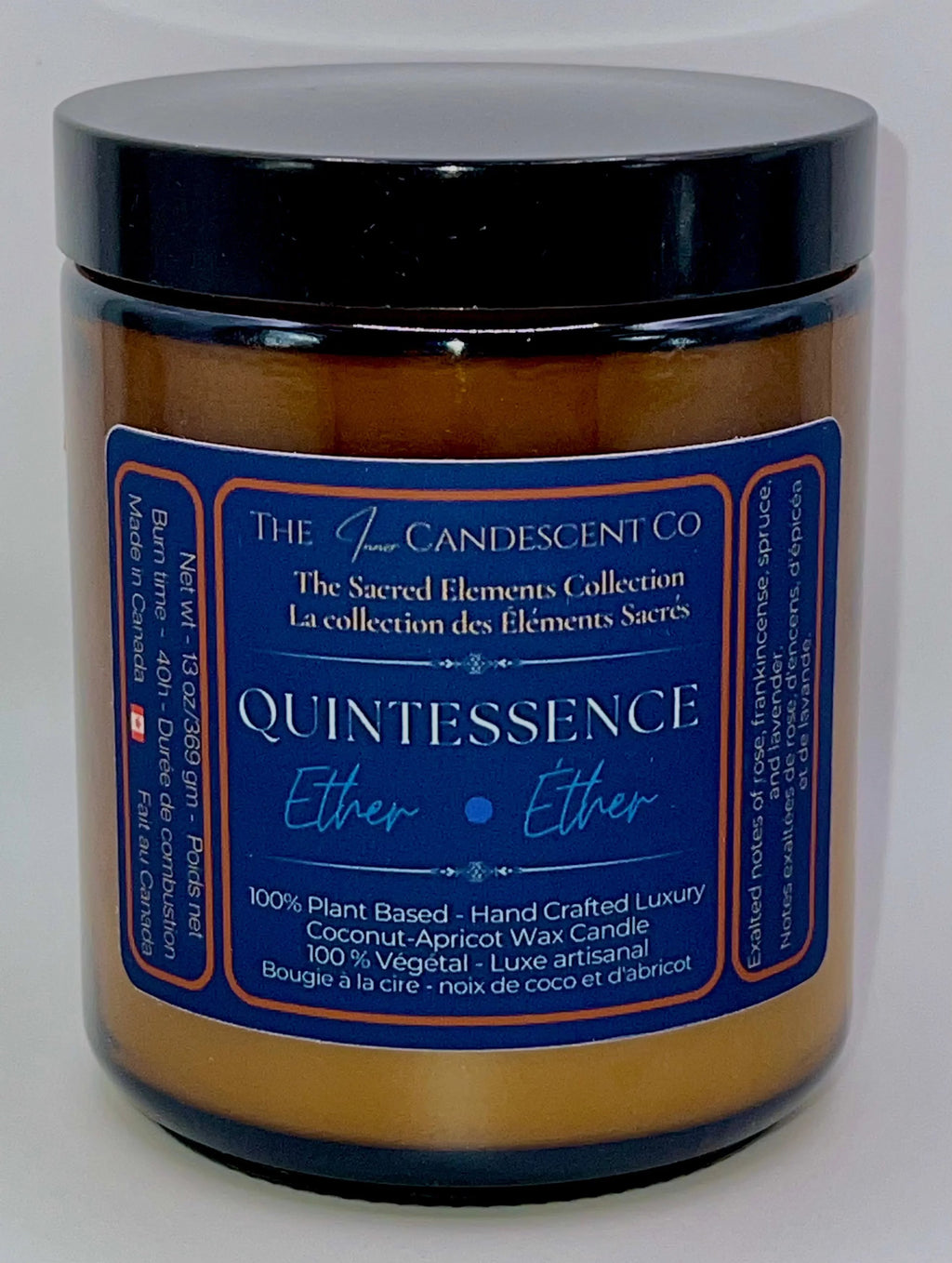 Luminous coconut and apricot wax candle from The InnerCandescent Co's Quintessence — Ether Element collection, burning with a soft glow.