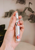 Bruine d'ambiance room spray Tulipa by Mimi & August in a 10ml bottle, featuring elegant packaging and a floral design.