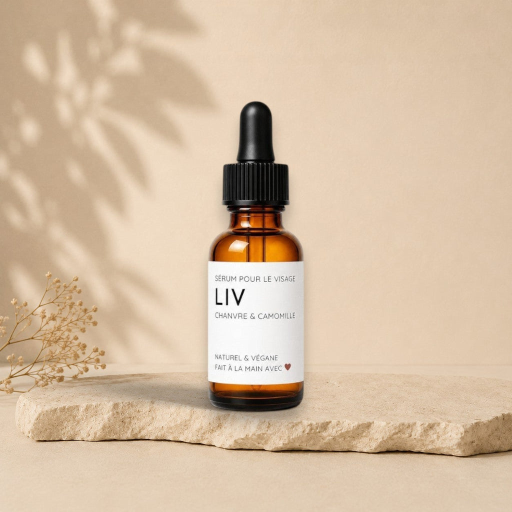 Natural hemp and chamomile face serum with Gua Sha massage tool from La Sultana Savonnerie for skincare and relaxation.