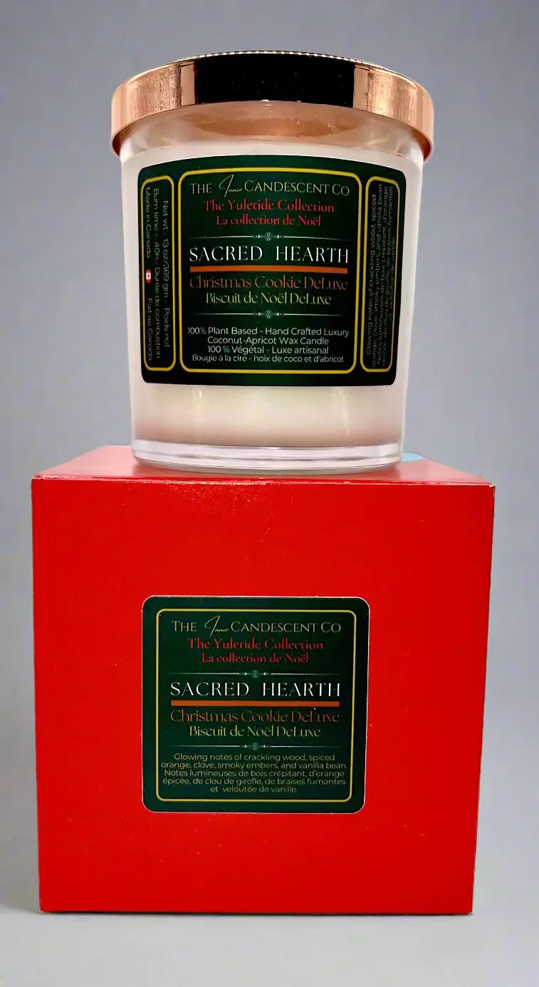 Sacred Hearth luxury coconut apricot wax candle by The InnerCandescent Co with warm spiced Christmas scent in a tall tower-shaped container.