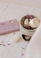 Soy wax melts in lilac color from Mimi & August, designed as fragrant wax tarts for home scenting.