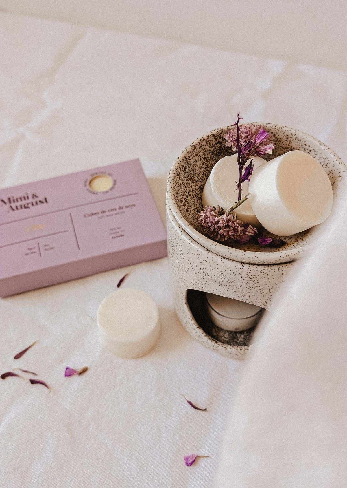 Soy wax melts in lilac color from Mimi & August, designed as fragrant wax tarts for home scenting.