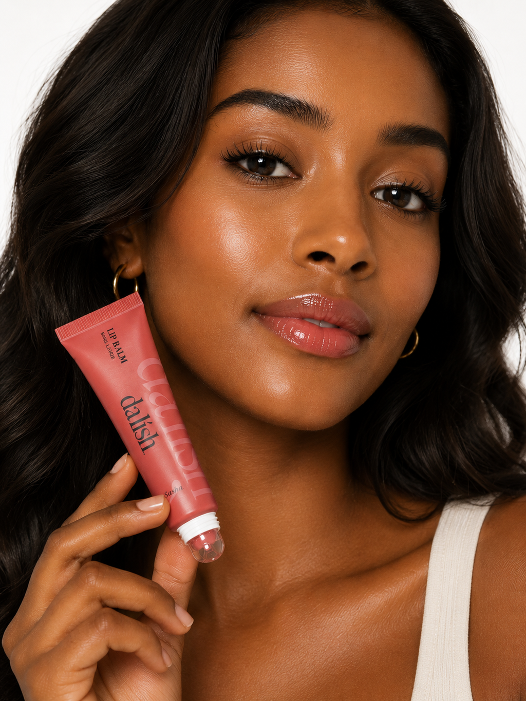 Hydrating tinted lip balm by da lish cosmetics, showcasing soft, healthy lips with natural buildable color on a model.