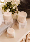 Mimi & August Topaze candle refill for home decor, showing a sleek, amber-colored candle container with the refill inside.
