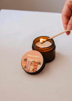 Mini Topaze soy candle by Mimi & August in a 2 oz glass jar, featuring a warm, inviting design with a natural wick.