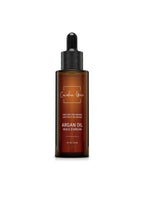 Organic 100% Argan Oil from Canadian Grace Wellness, shown in a glass bottle with a dropper, ideal for dry skin and frizz-prone hair.