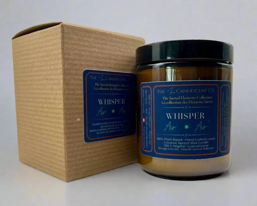 A luxurious coconut and apricot wax candle from The InnerCandescent Co, with a sleek design and a soft, airy aesthetic.