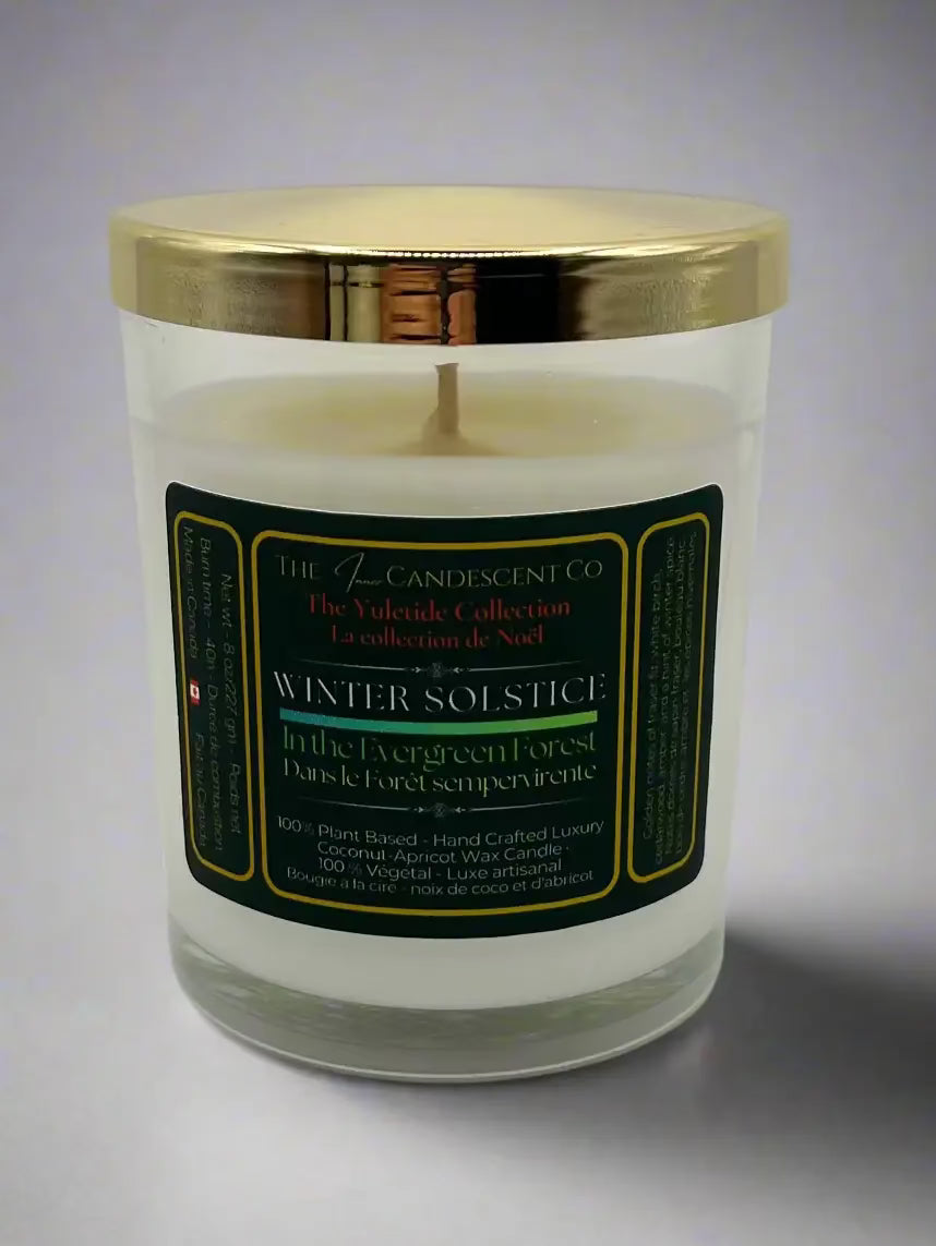 Luxury coconut apricot wax candle from The InnerCandescent Co with winter woods scent, displayed in a glass jar.